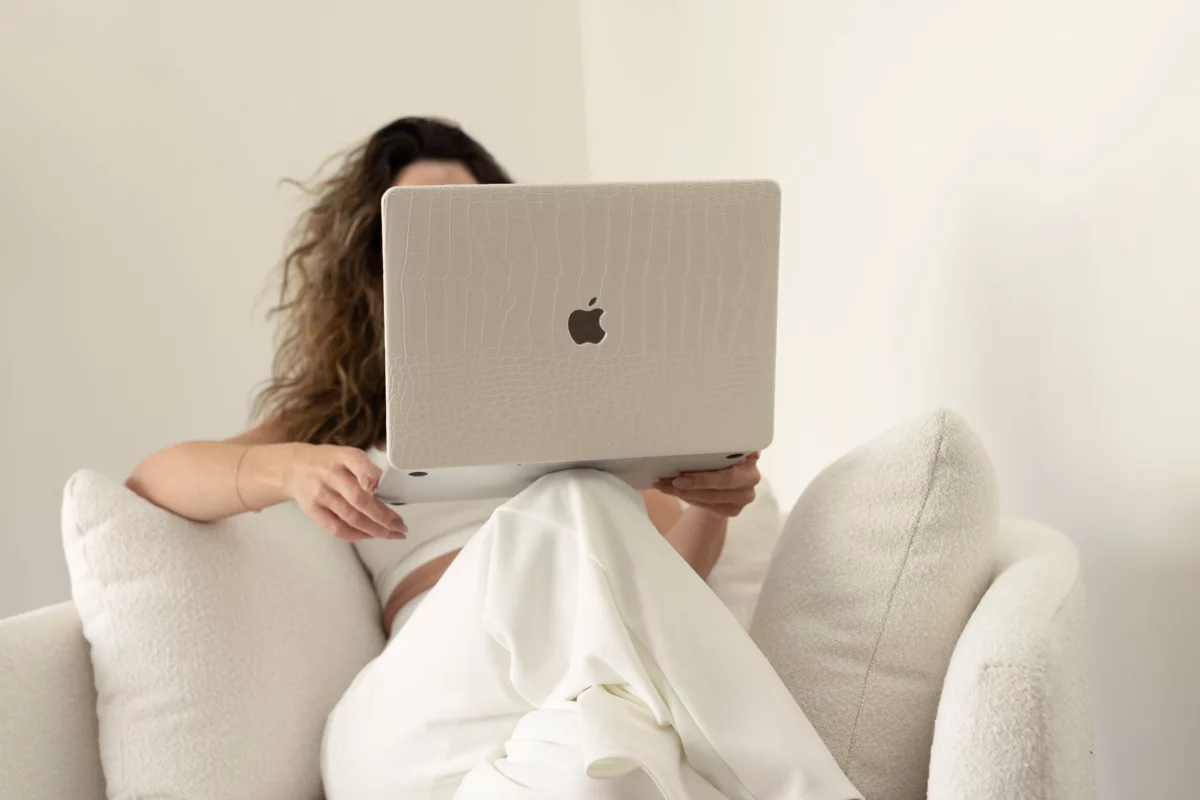 Woman works on laptop | Skyler Soares Skin Clinic | Scottsdale, AZ