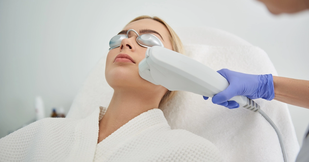 Woman receiving MOXI Laser Treatment on face at a clinic in Scottsdale, AZ