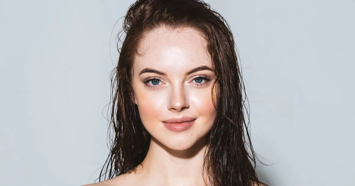 Woman with glowing skin after DiamondGlow Facial in Scottsdale, AZ